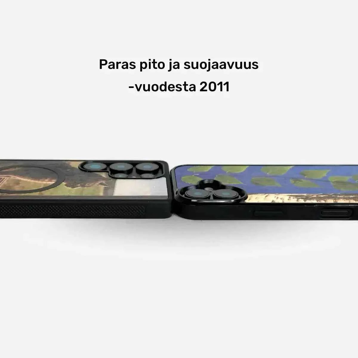 Lastu Kaksi puhelinta Oulun Lastu KUWA suojakuorissa: iPhone 17 Pro ja Galaxy S26, aitoa puuta, suojakuoret.