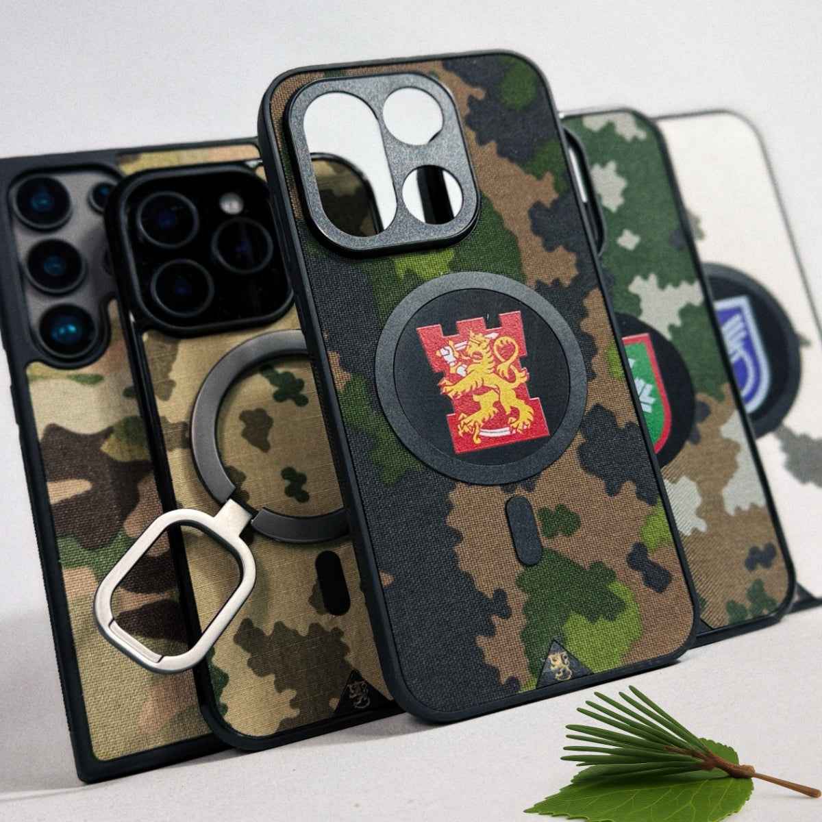 Lastu Lastu WOIMA puhelimen kuoret sininen camo, MagSafe®, mänty, iPhone 17 Pro, Galaxy S26, OnePlus 15 mukana.