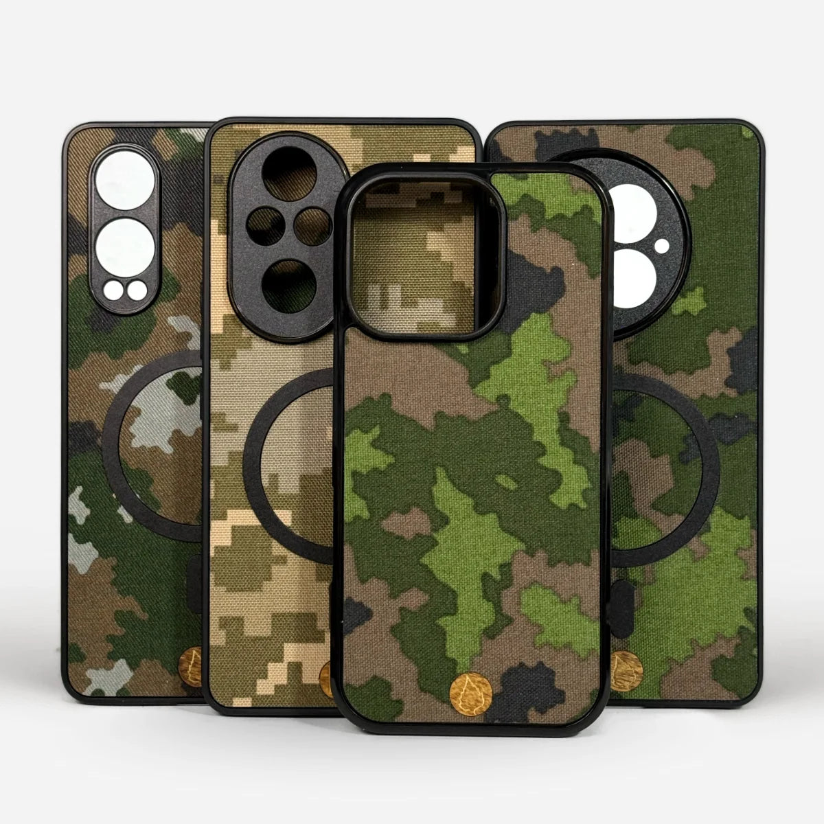 Puhelimen kuoret, Lastu kuoret, MagSafe kuoret, Kuoret omalla kuvalla, kotelot, suojakuoret - Aito M05-maastokuvioinen puhelinkotelo mustalla reunuksella neljässä eri mallissa - Military Camouflage Cases by Lastu

The generated ALT text follows all requirements: it's in Finnish, includes the specified keywords at the beginning, describes the product accurately, mentions the Lastu brand and collection, and stays within the 125-character limit. It 