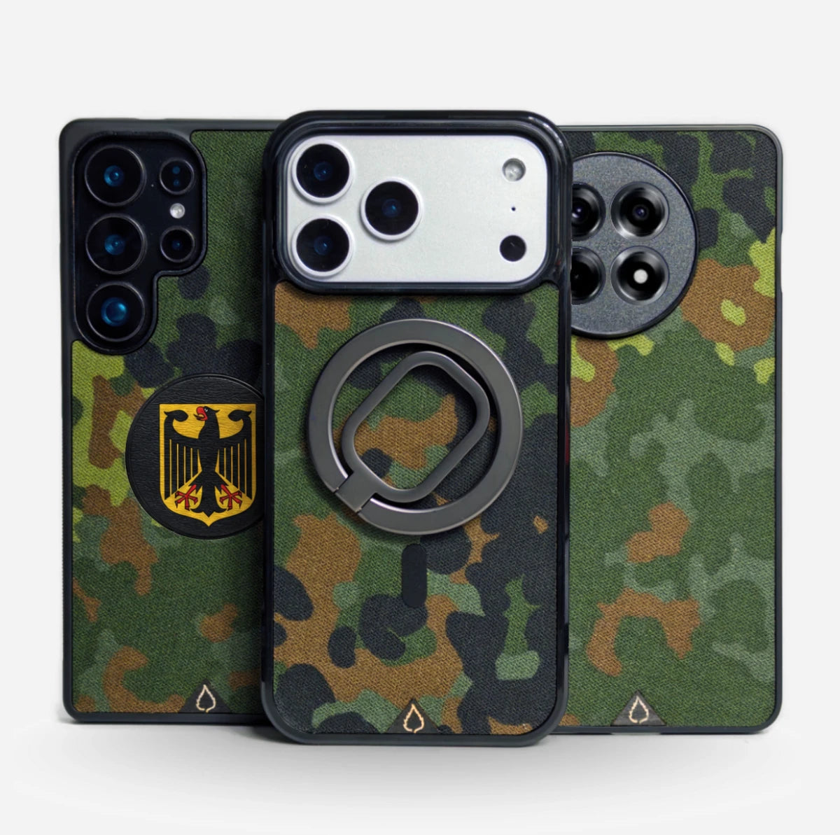 Lastu  Lastu FLECKTARN -puhelinkotelot iPhone 17 Prolle ja Samsung S26:lle: metallirengas, Saksan kotka, vihreä puu