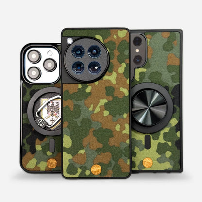 Saksalaisen armeijan Flecktarn-maastokuvioinen puhelinkotelo iPhonelle, Samsungille, OnePlusille ja Google Pixelille. Kestävä suojakuori aidosta Bundeswehrin kangasmateriaalista MagSafe-yhteensopivuudella ja tarrakiinnityksellä. Laadukas ja suojaava Lastu-tuote.