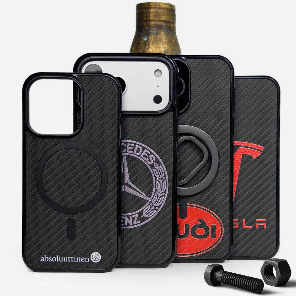 Lastu  Lastu KARB hiilikuitu puhelimen kuoret iPhone 17 Pro, Galaxy S26, OnePlus 15 logoilla, taustalla pultteja.