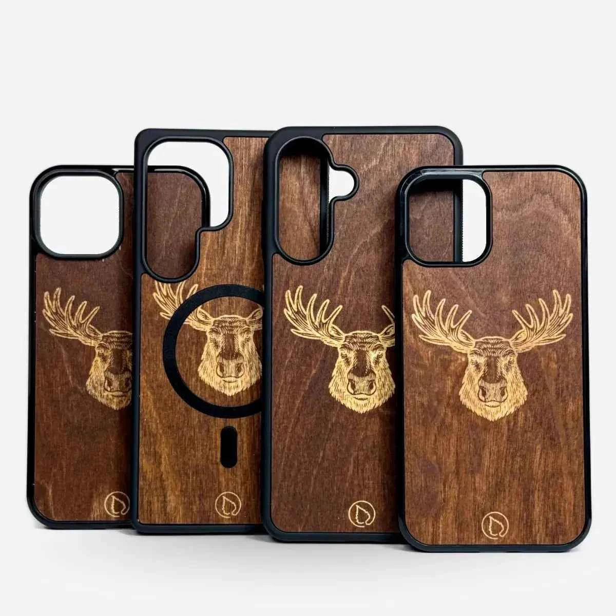 Lastu  Lastu TERWA -puhelimen kuoret tervalla käsitellystä koivusta, hirven kaiverrus, iPhone 17 Pro, Galaxy S26 taustalla.