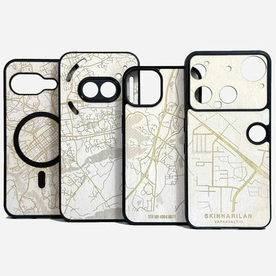Lastu  Neljä Lastu KARTTA -puhelimen puukoteloa iPhone 17 Pro-, Galaxy S26-, OnePlus 15- ja Pixel 10 -malleille vierekkäin.