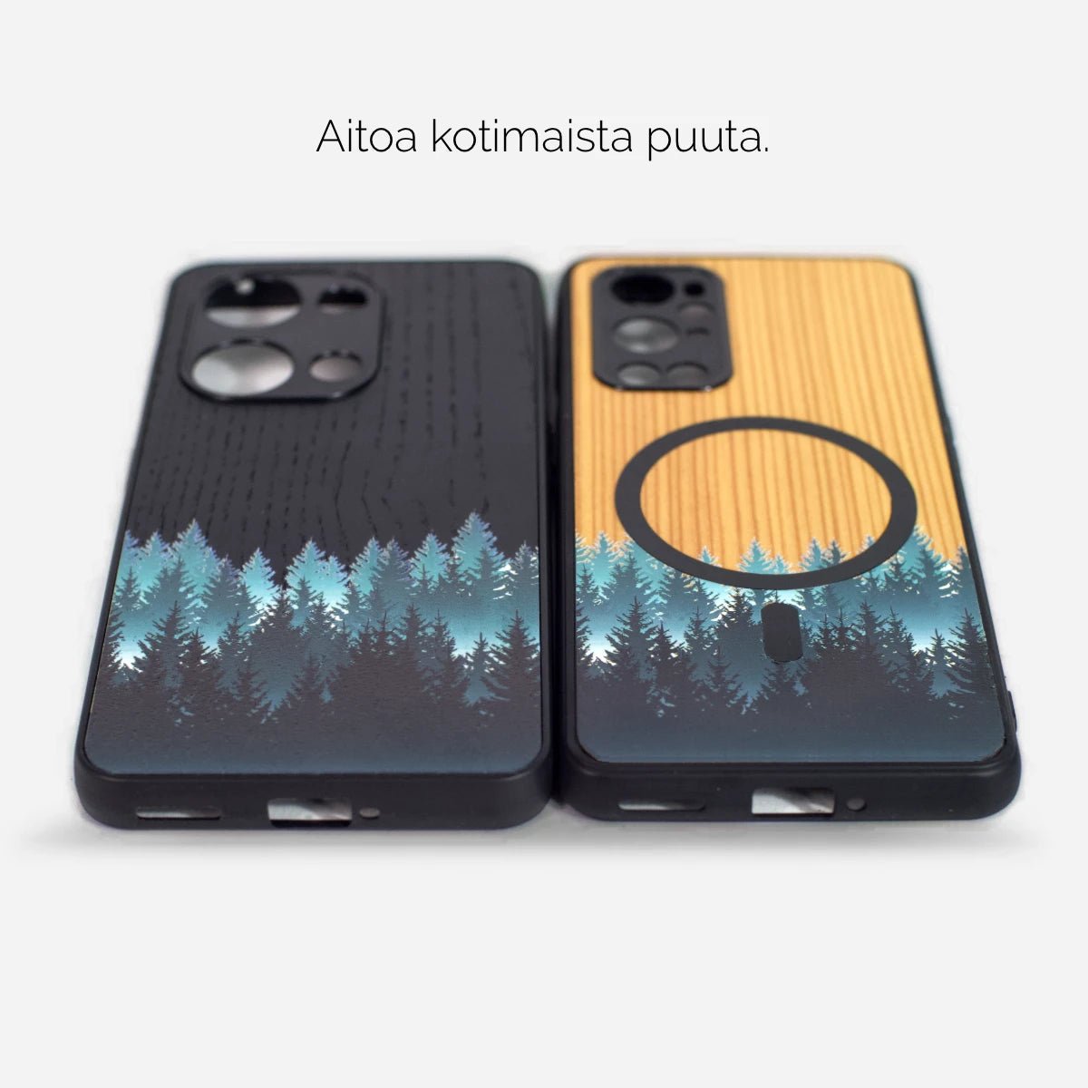 Kaksi puista puhelinkuorta metsämaisemakuviolla, toinen musta ja toinen vaalea. Kuvioissa sinertävä metsä. Vaaleassa kuoressa magneettinen rengaspidike. Yhteensopiva iPhone, Samsung, OnePlus ja Google Pixel -puhelimille. Lastu.