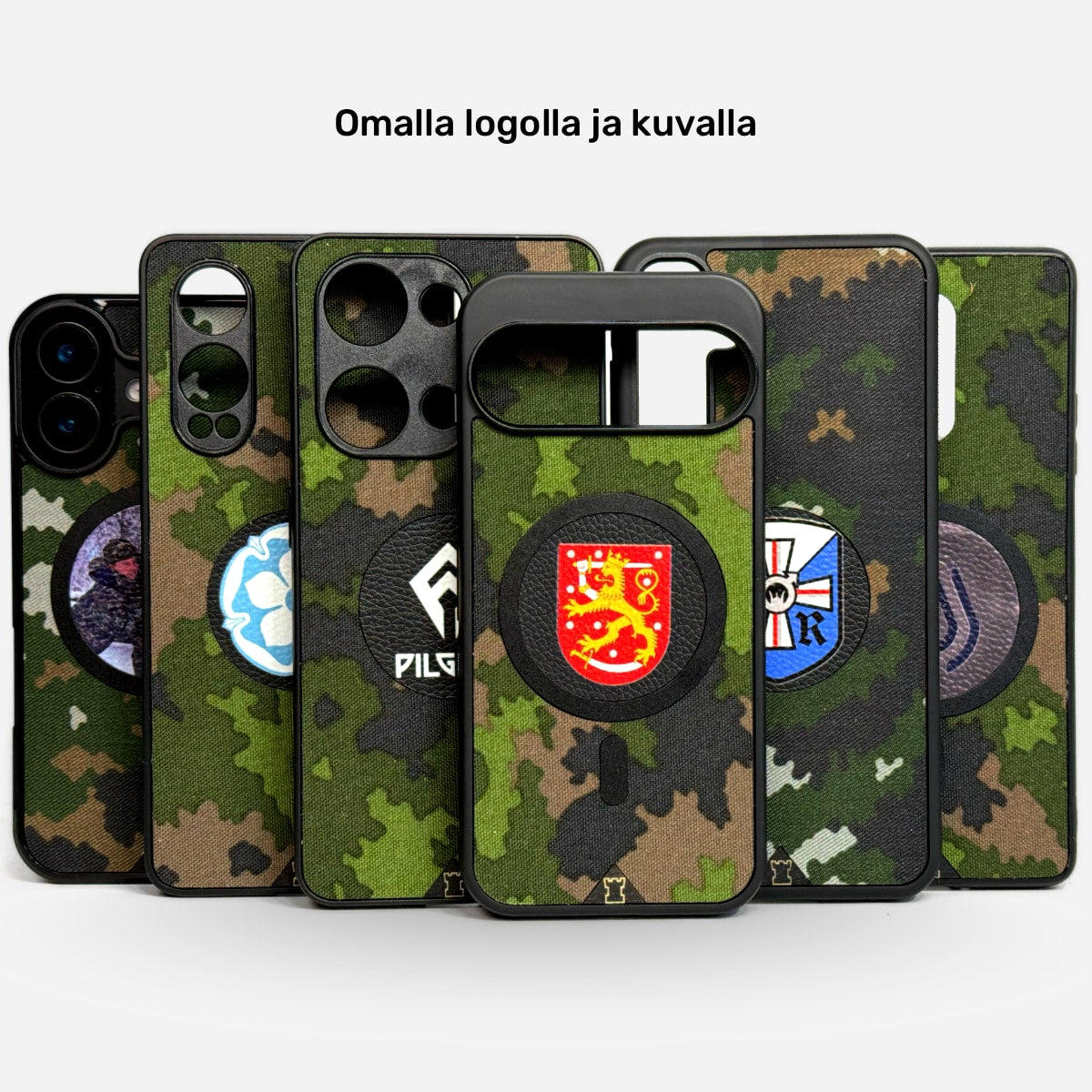 Tactical Essence puhelinkotelo, jossa erilaisia sotilaskuvioita ja merkkejä M05-maastokuvioidulla taustalla - Lastu